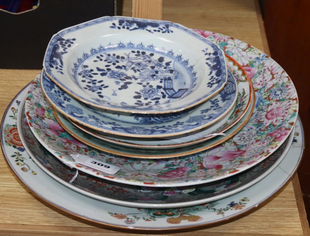 A collection of Oriental chargers and plates,